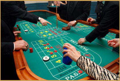 Craps dice table hire with players placing fun money bets