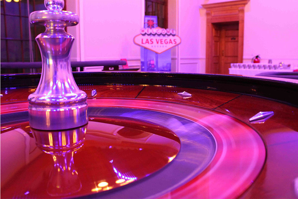 Themed party night with casino tables and decor